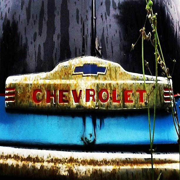 Emblem Photograph - #rust #rusty #vintagecar #emblem #chevy by John Robinson
