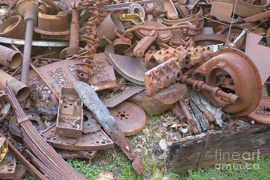 Rusted Metal Photograph - Rusted Cast Iron Scrap Pile by Inga Spence