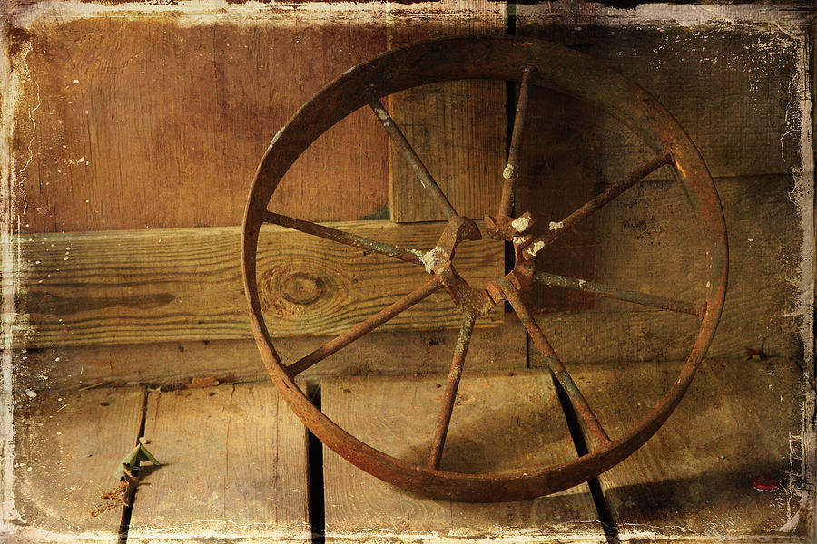 Rusted Wagon Wheel Photograph by Toni Hopper