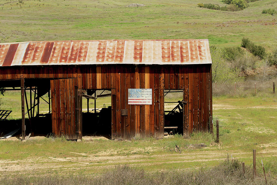 Rustic Barn with Flag Photograph by Art Block Collections