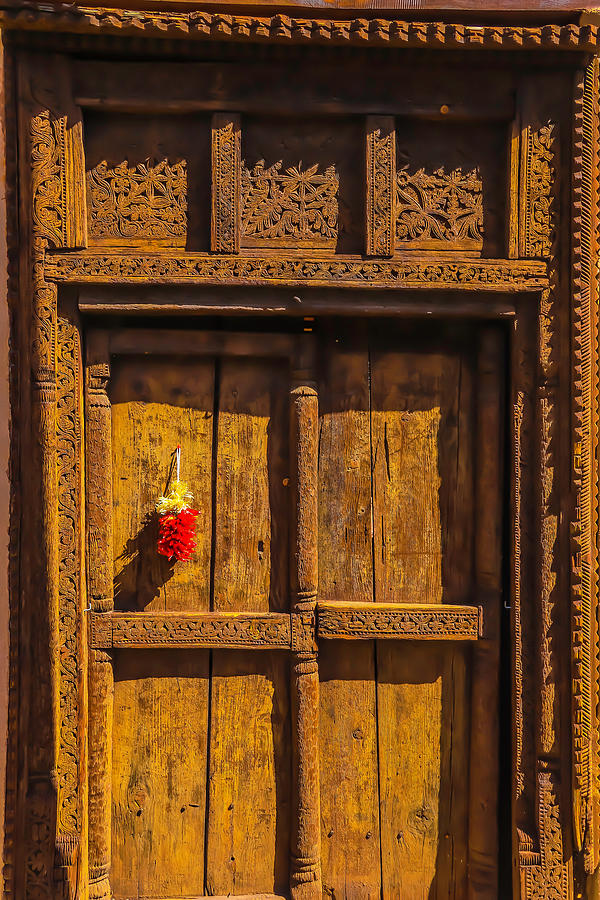 Rustic Brown Door With Chillies Photograph by Garry Gay