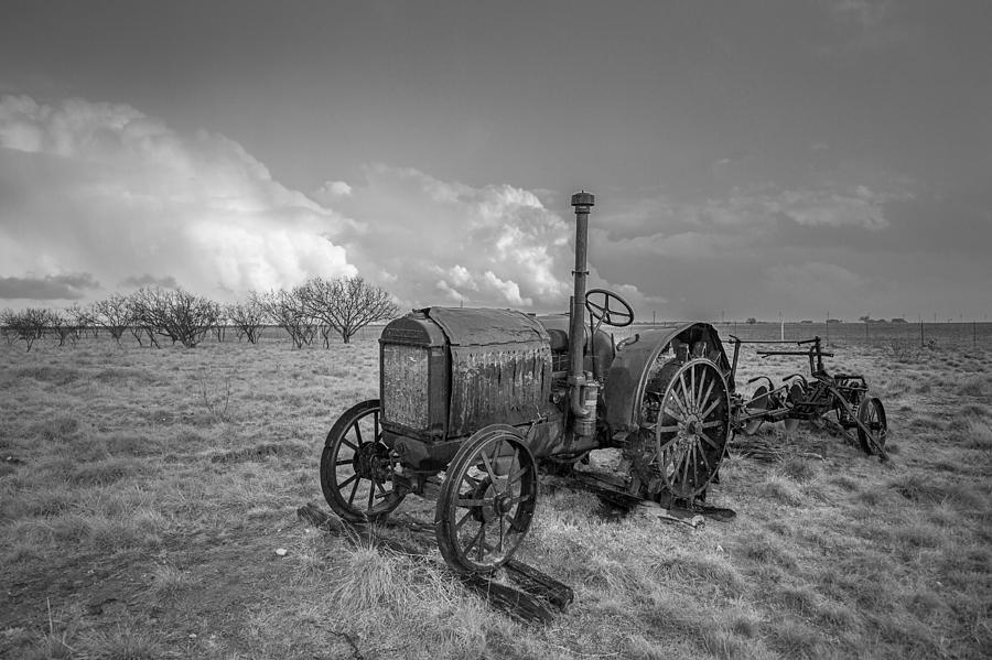 Black And White Photograph - Rustic Tractor - Black and White Photo of Old McCormick-Deering Tractor in Southern Texas by Southern Plains Photography