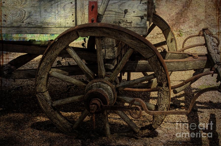 Rustic Wagon Wheel Photograph by Luther Fine Art