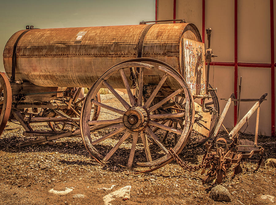 Rustic Water Wagon and Plow Photograph by Gene Parks