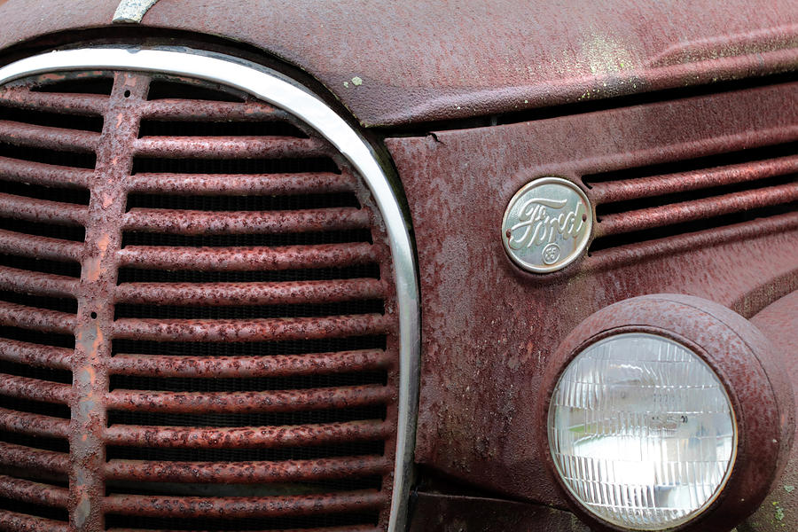 Rusty Ford Emblem Photograph by Lori Deiter