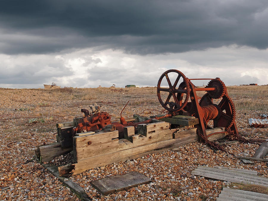 Rusty Gears Abandoned on the Beach Photograph by Gill Billington