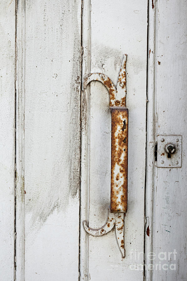 Rusty handle on white door Photograph by Elena Elisseeva