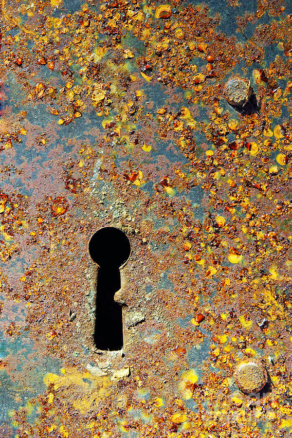 Rusty key-hole Photograph by Carlos Caetano