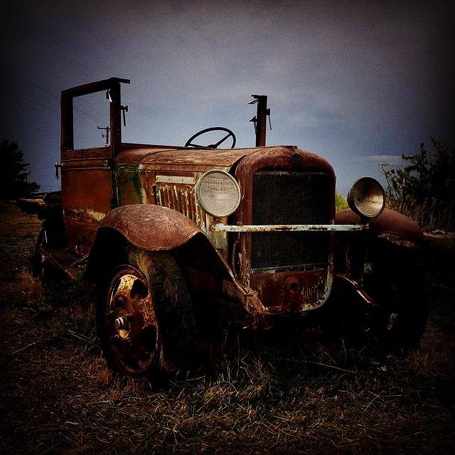 Car Photograph - #rusty #old #car From A #bygone #era At by Ron Meiners