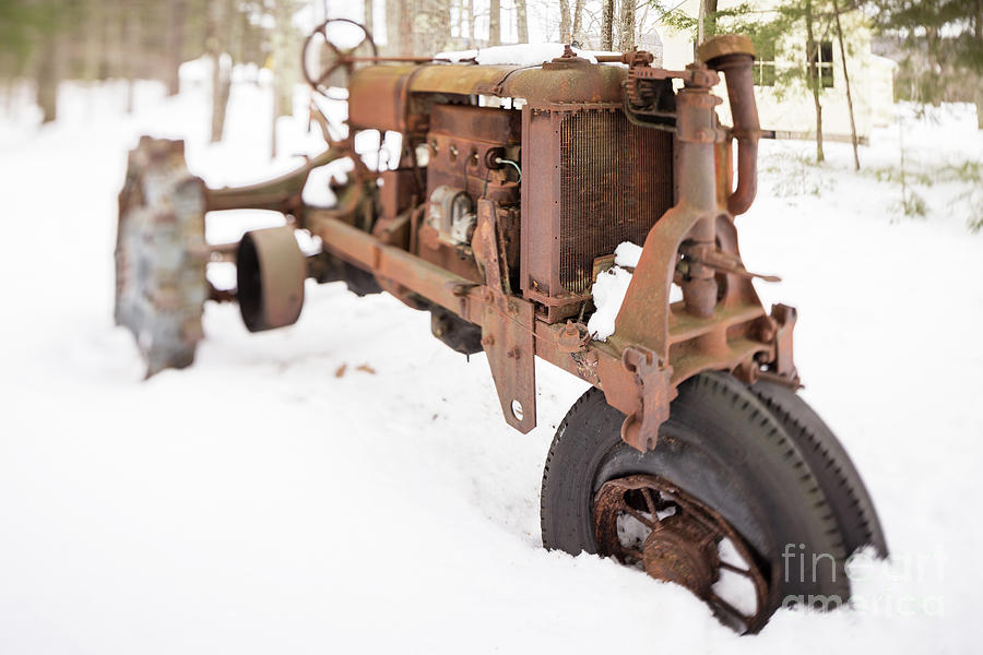 Rusty Old Steel Wheel Tractor in the Snow Tilt Shift Photograph by Edward Fielding