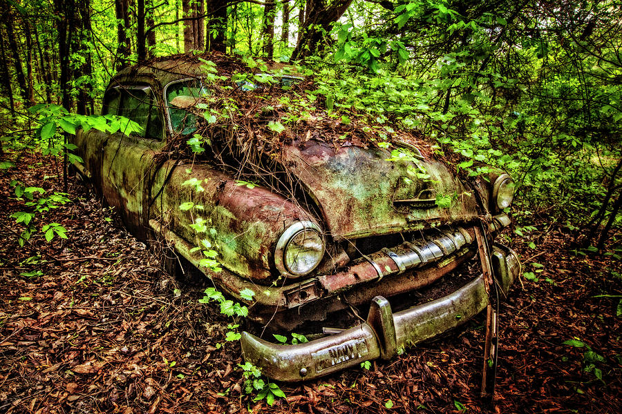 Rusty Plymouth Photograph by Debra and Dave Vanderlaan