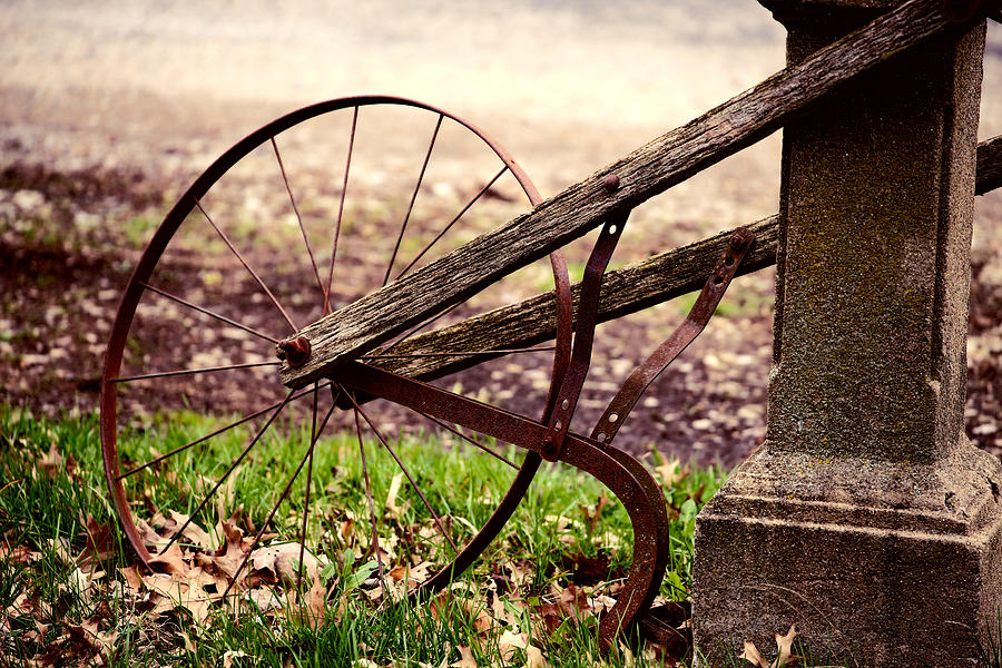 Rusty Seed Plow Against Horse Post Photograph by Theresa Campbell