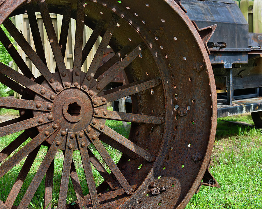 Rusty Wheel Photograph by Olga Hamilton