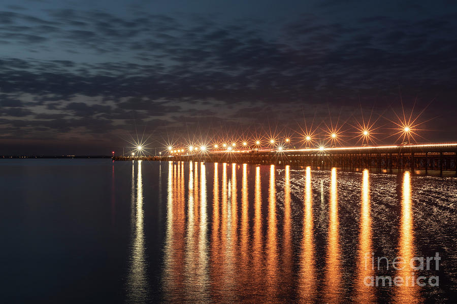 Ryde Pier at Sunset with light reflections Photograph by Clayton Bastiani