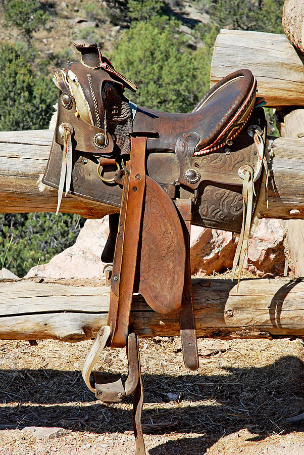 Saddle on Ranch Fence Photograph by Robert Meyers-Lussier