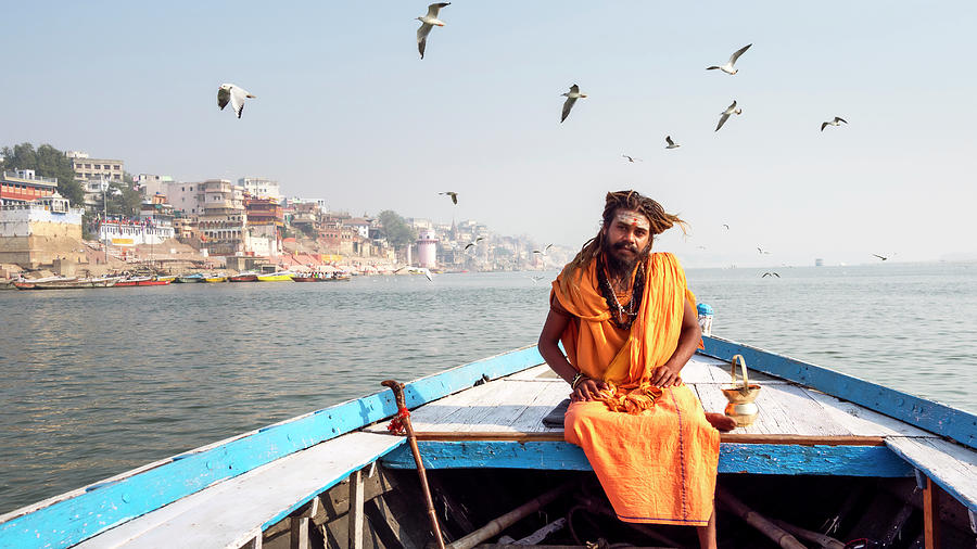Portrait Photograph - Sadhu in a boat. by Usha Peddamatham