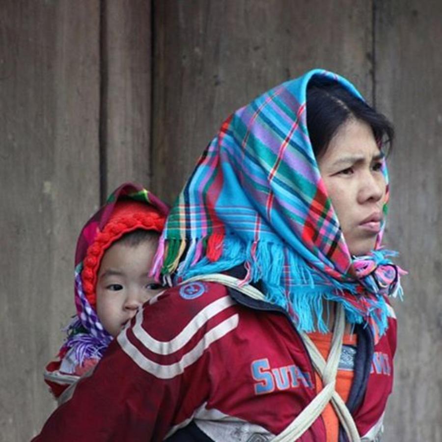 Vietnam Photograph - Safe On Mothers Back by Jesper Staunstrup
