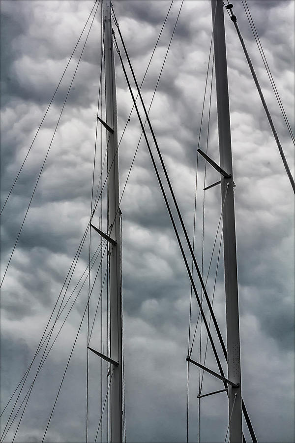 Saiboat Masts and Clouds Photograph by Robert Ullmann