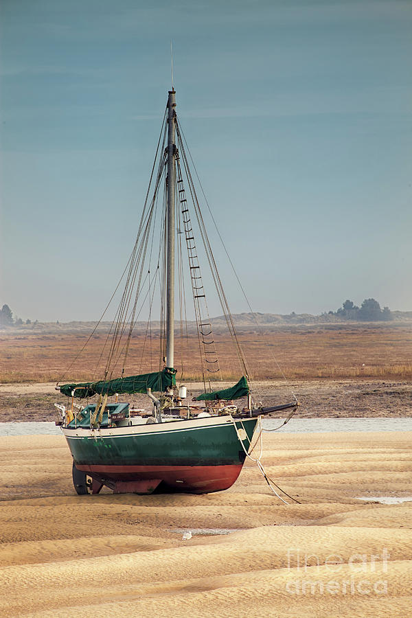Norfolk sail boat stranded at low tide Photograph by Simon Bratt