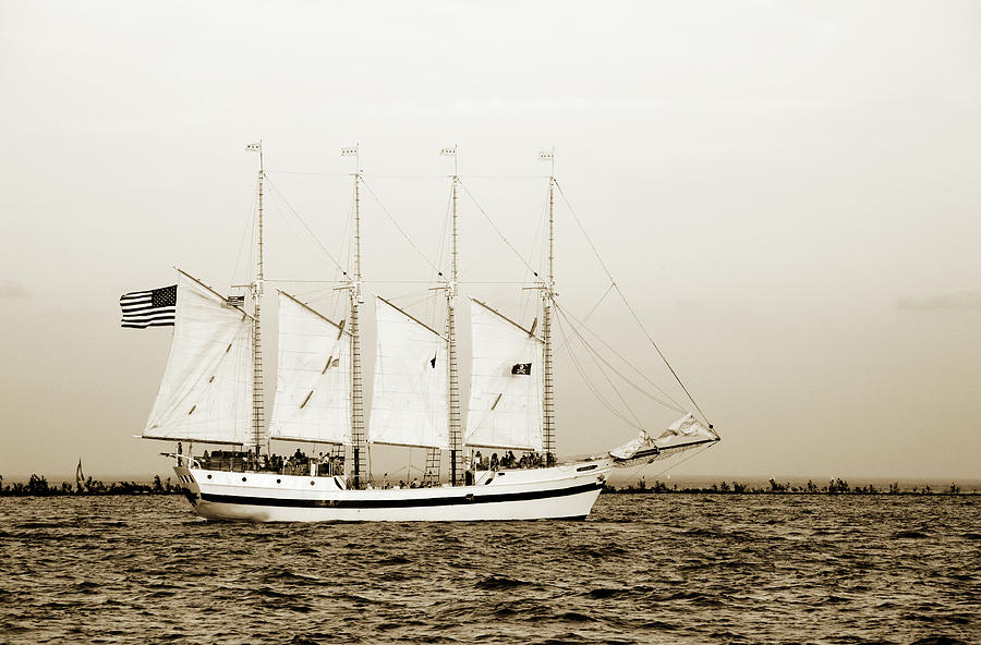 Sail Boat With American Flag Photograph