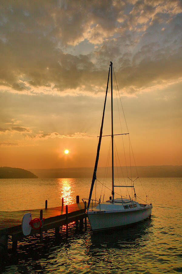 Sailboat and Sunrise Photograph by Steven Ainsworth