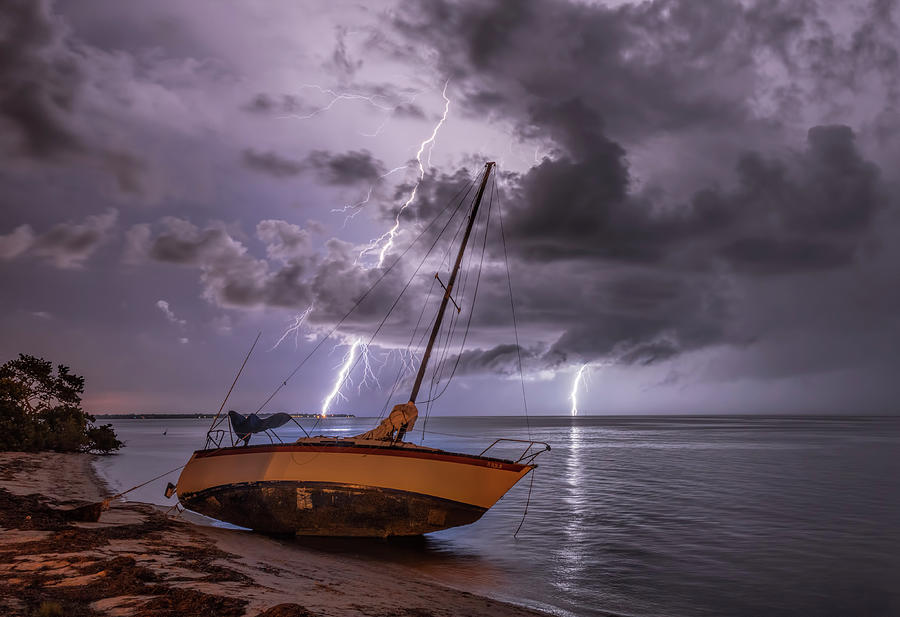 Sailboat and the Storm Photograph by Justin Battles