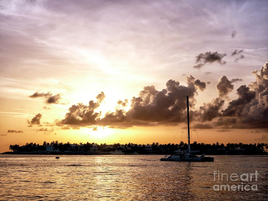 Key West Sailboat at Sunset Photograph by John Rizzuto