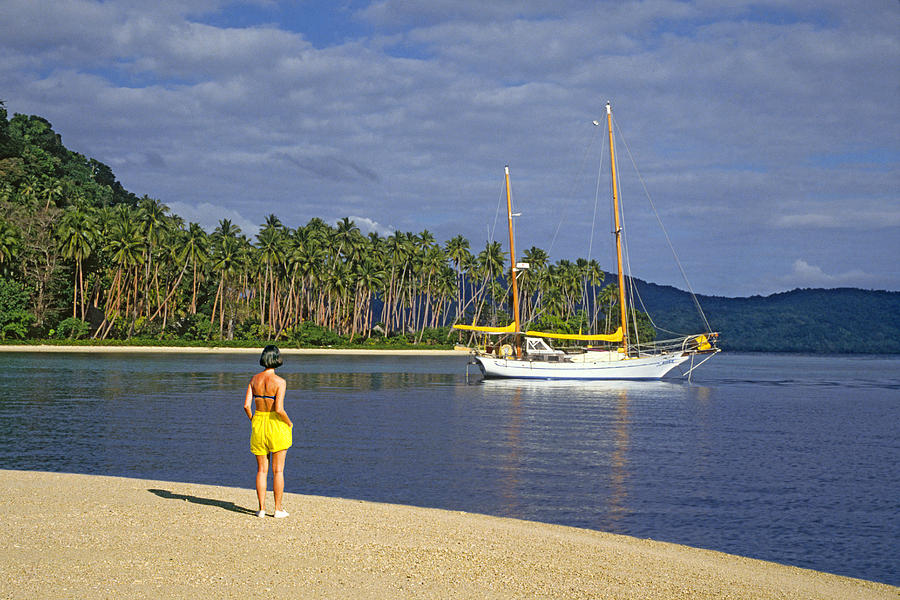 sailboat in the Fiji Islands Photograph by Buddy Mays