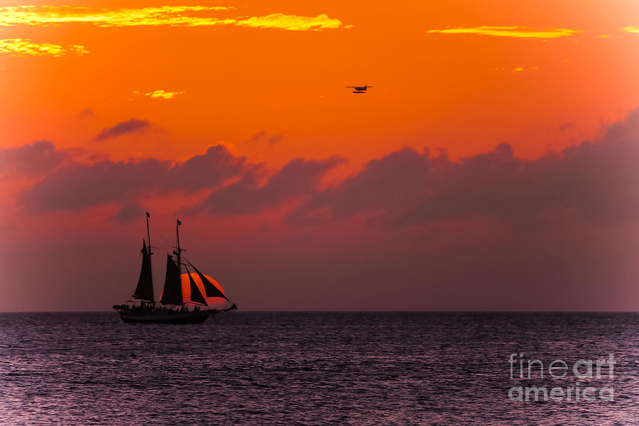 Sailing boat at sunset Photograph by Claudia M Photography