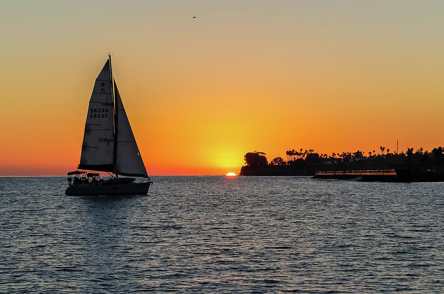 Sailing into the Sunset Photograph by Kathleen McGinley