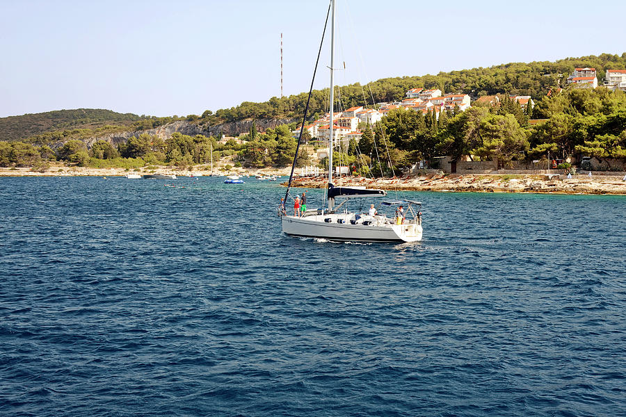 Sailing Past Hvar Town Photograph by Sally Weigand