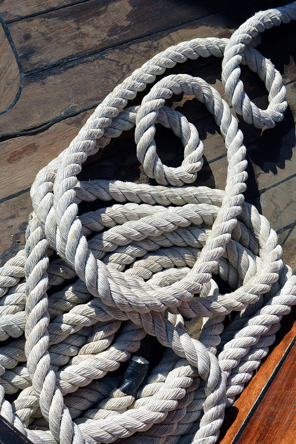 Sailing rope on wooden floor Photograph by Oana Unciuleanu - Fine