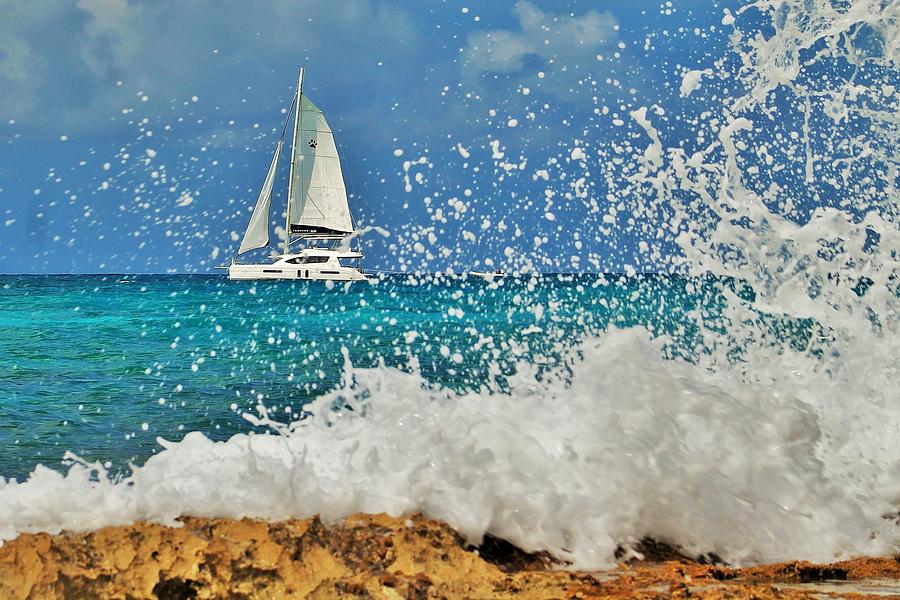 Sailing Through The Sea Foam Photograph by Karl Anderson