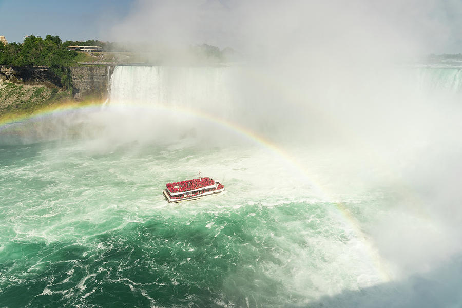 Sailing Under Niagara Falls Rainbow - Hornblower Boat Cruise Photograph by Georgia Mizuleva