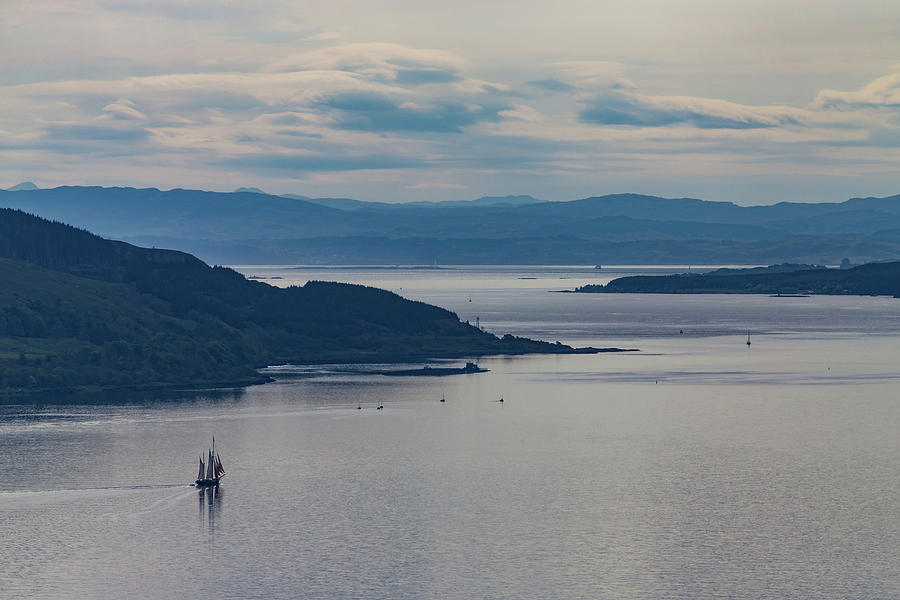 Mountain Photograph - Sailing vessel at the coast of Scotland by Johan Elzenga