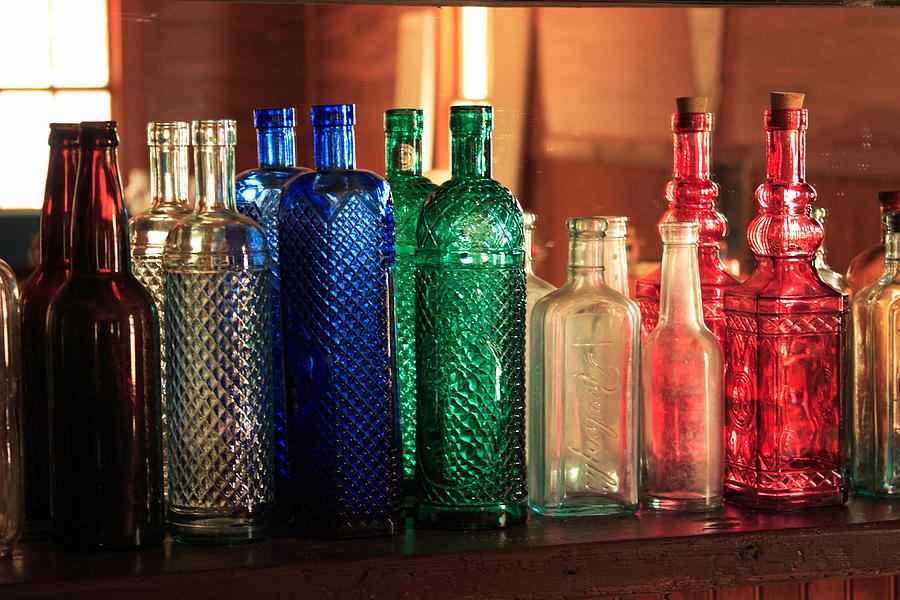 Saloon bottles Photograph by Toni Hopper