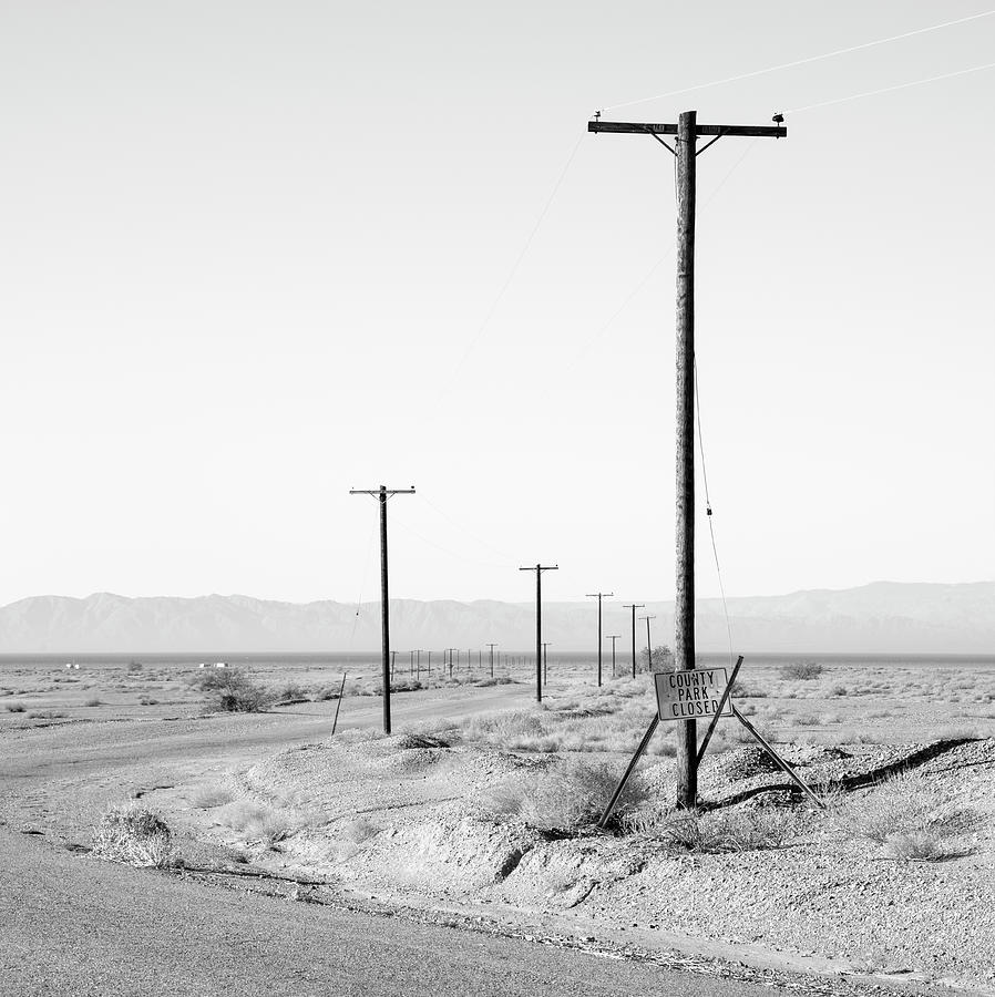 Black And White Photograph - Salton Sea Deserted Road by William Dunigan