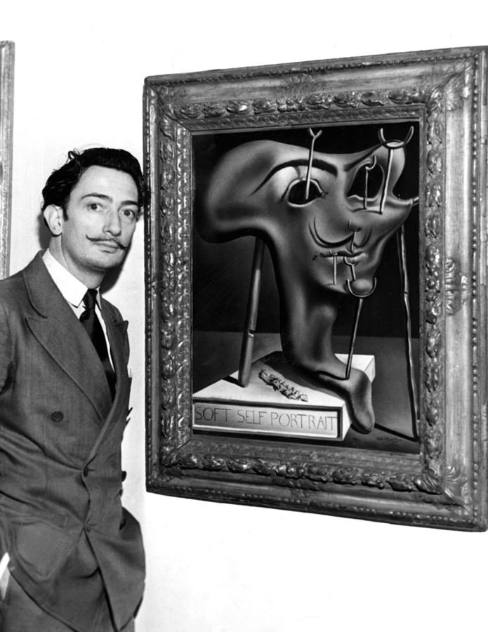 Salvador Dali, Showing Off His Piece Photograph by Everett