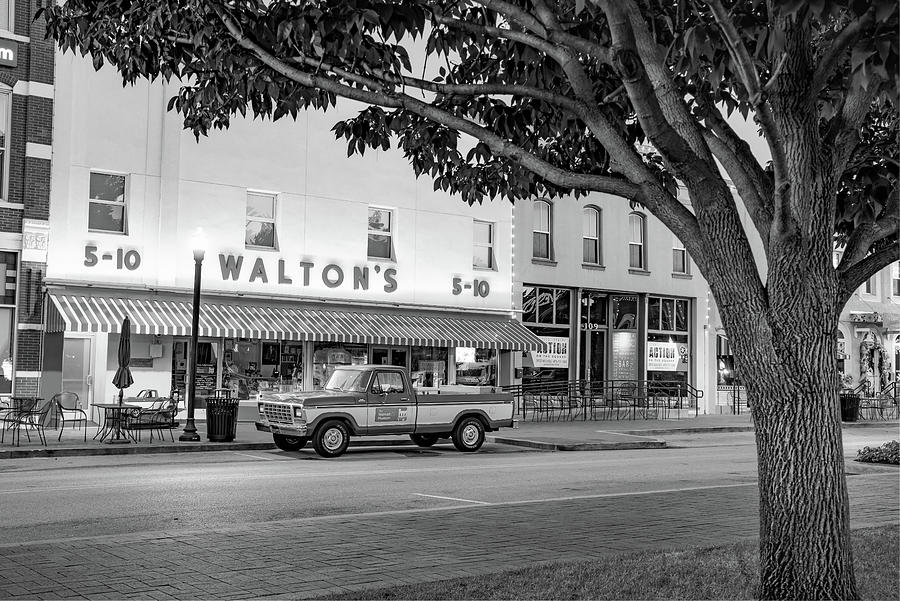 Black And White Photograph - Historic Wheels Of Commerce - A Bentonville Arkansas Legacy In Black And White by Gregory Ballos