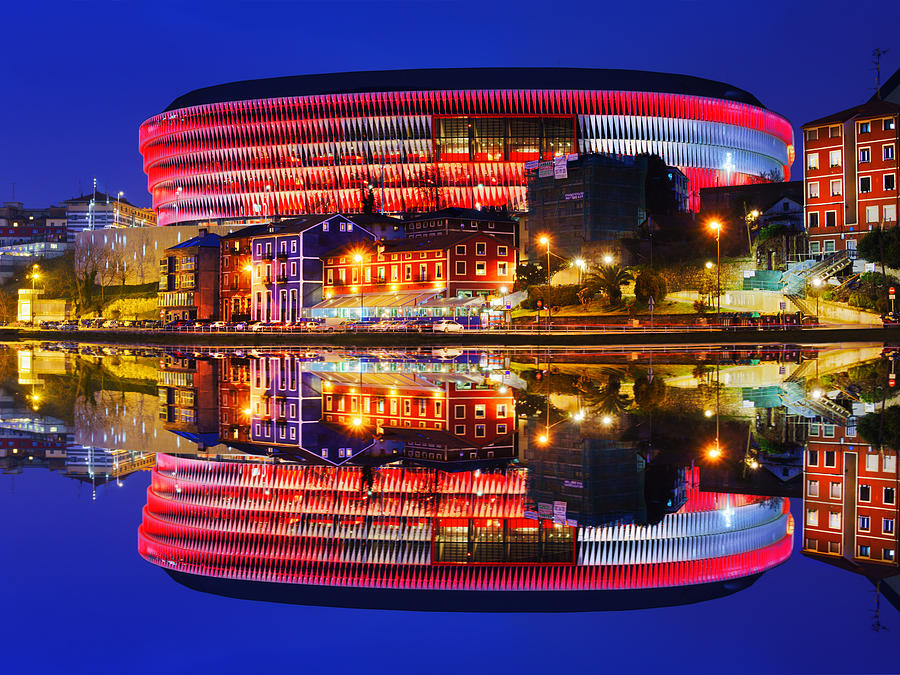 San Mames Stadium At Night With Water Reflections Photograph by Mikel Martinez de Osaba