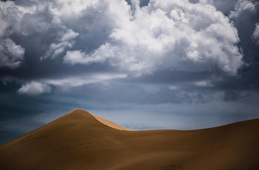 Sand and Clouds Photograph by Bo Nielsen