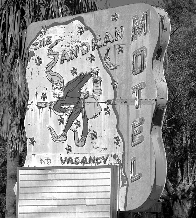 Sandman Hotel sign black and white Photograph by David Lee Thompson