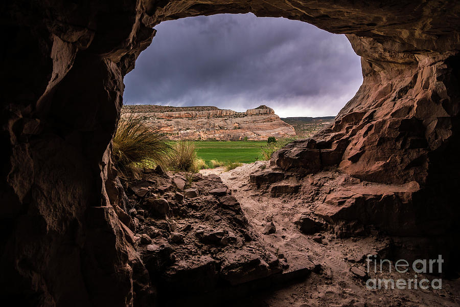 Sandstone Cave in Stormy Weather - Moab - Utah Photograph by Gary Whitton