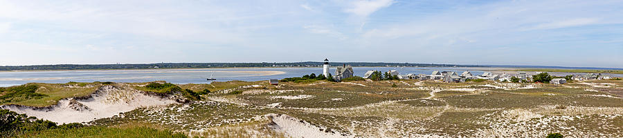 Sandy Neck Lighthouse with fishing boat Photograph by Charles Harden