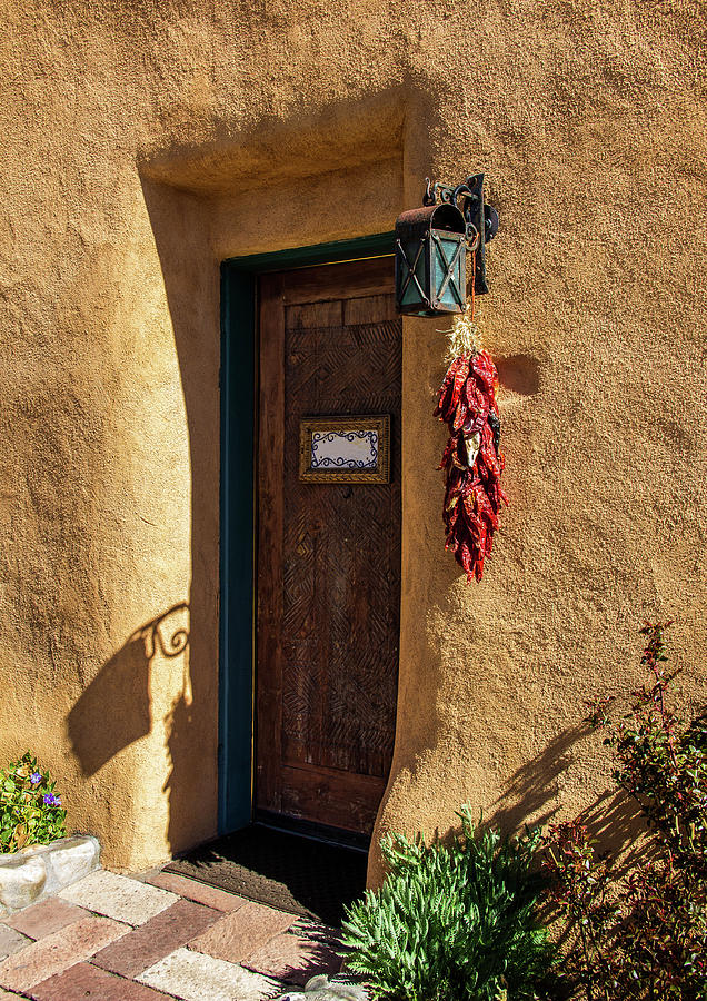 Santa Fe Door with Hanging Red Chile Peppers Photograph by Roslyn Wilkins