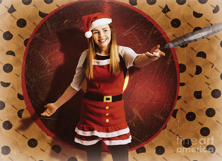 Santa woman spinning christmas music at club Photograph by Jorgo Photography