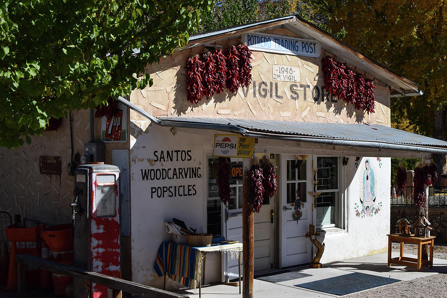 Santos Woodcarving and Popsicles in Chimayo Photograph by Tom Cochran