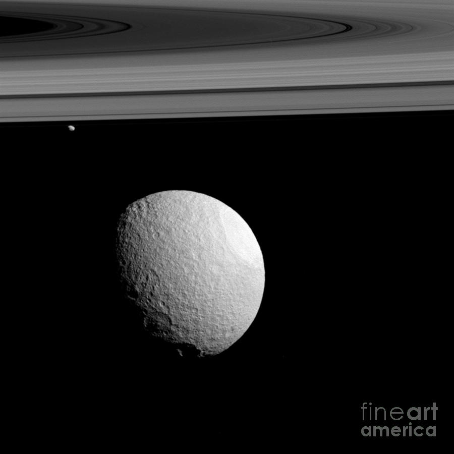 Saturns Moons, Tethys And Janus Photograph by Science Source