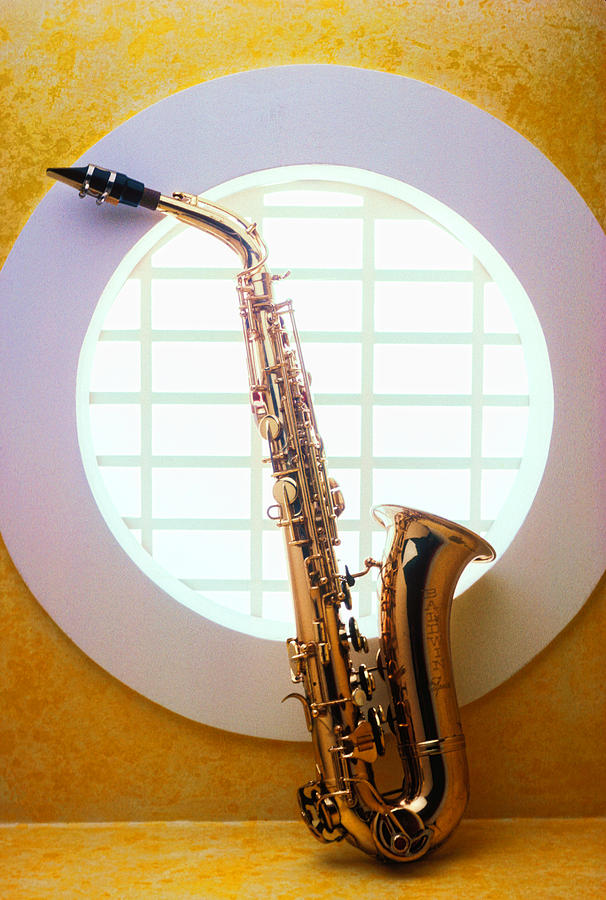 Saxophone in round window Photograph by Garry Gay