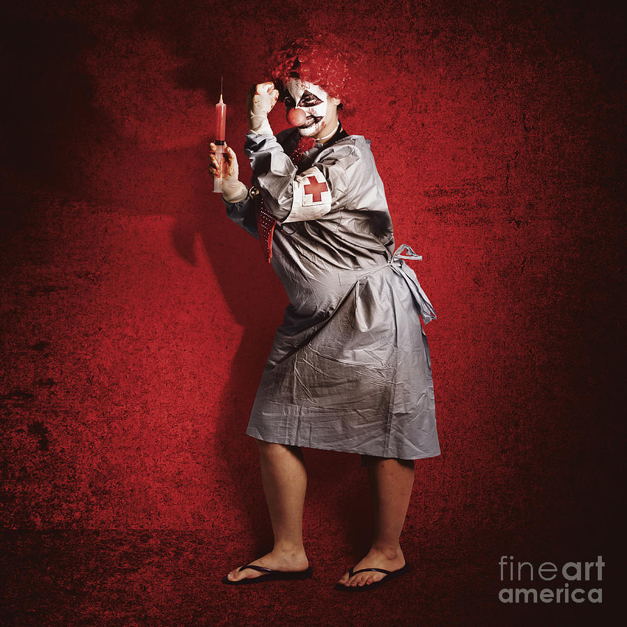Halloween Photograph - Scary clown doctor about to give jab with syringe by Jorgo Photography